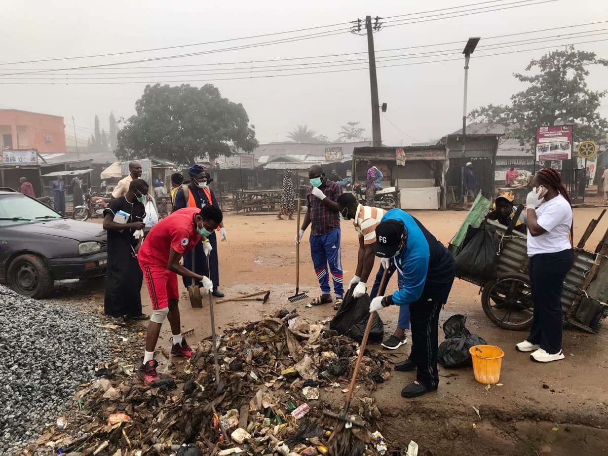 Volunteers cleaning up waste in the community